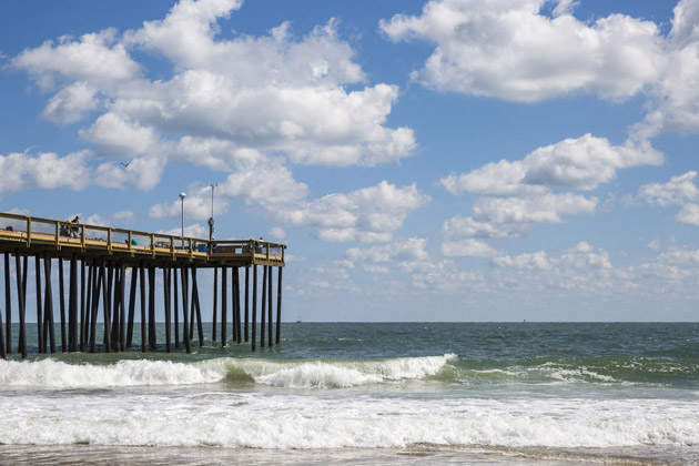 Ocean city pier with waves in the daytime